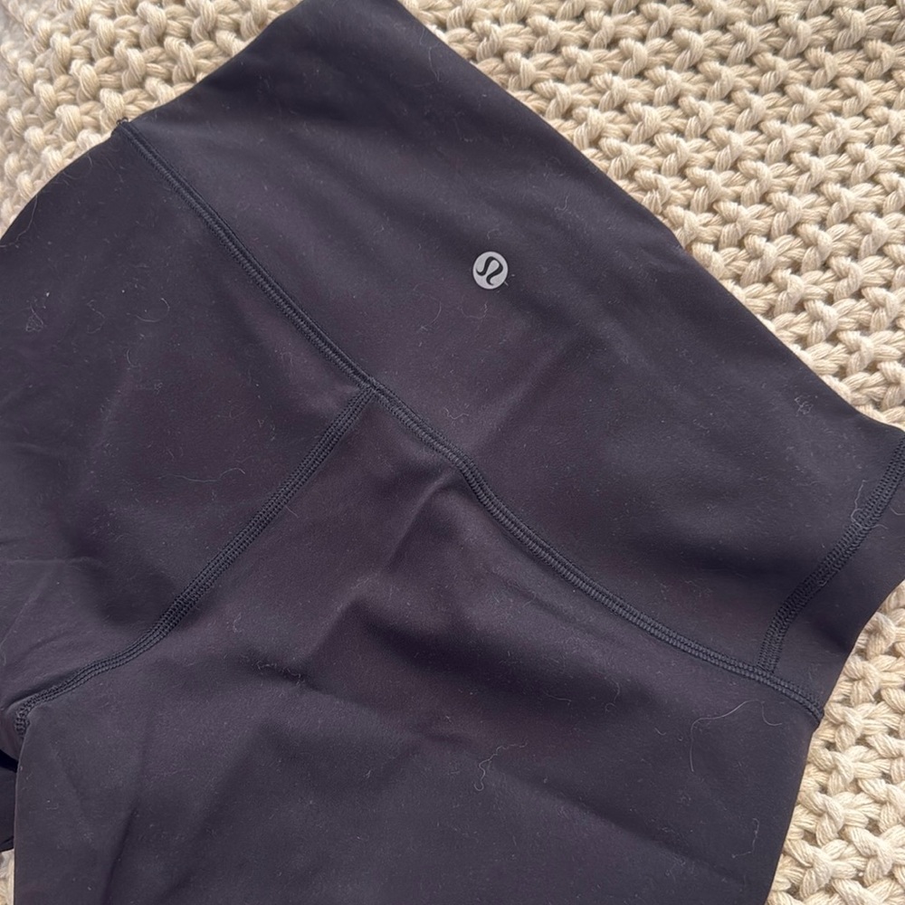 Women’s black wunder under biker shorts size 4